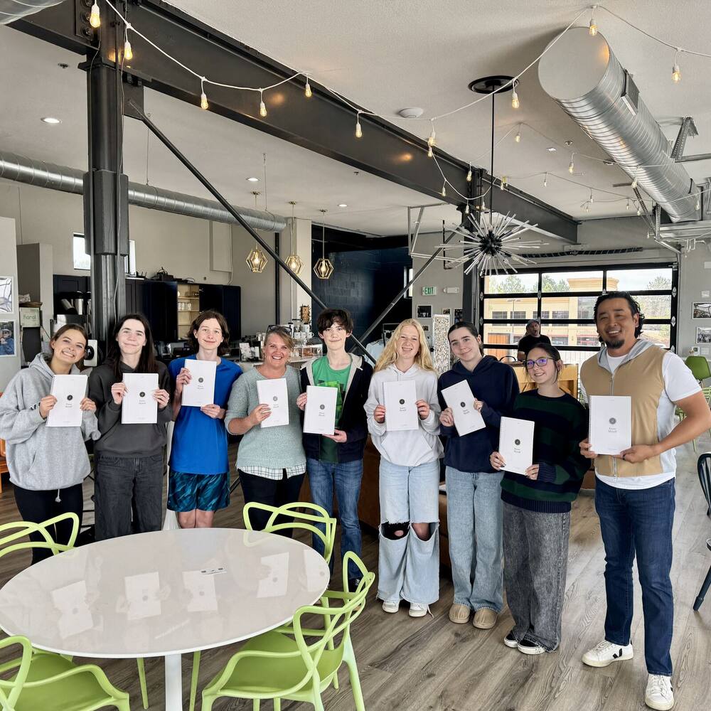 VALE students holding their new Know Myself journals at the first i get to foundation engagement