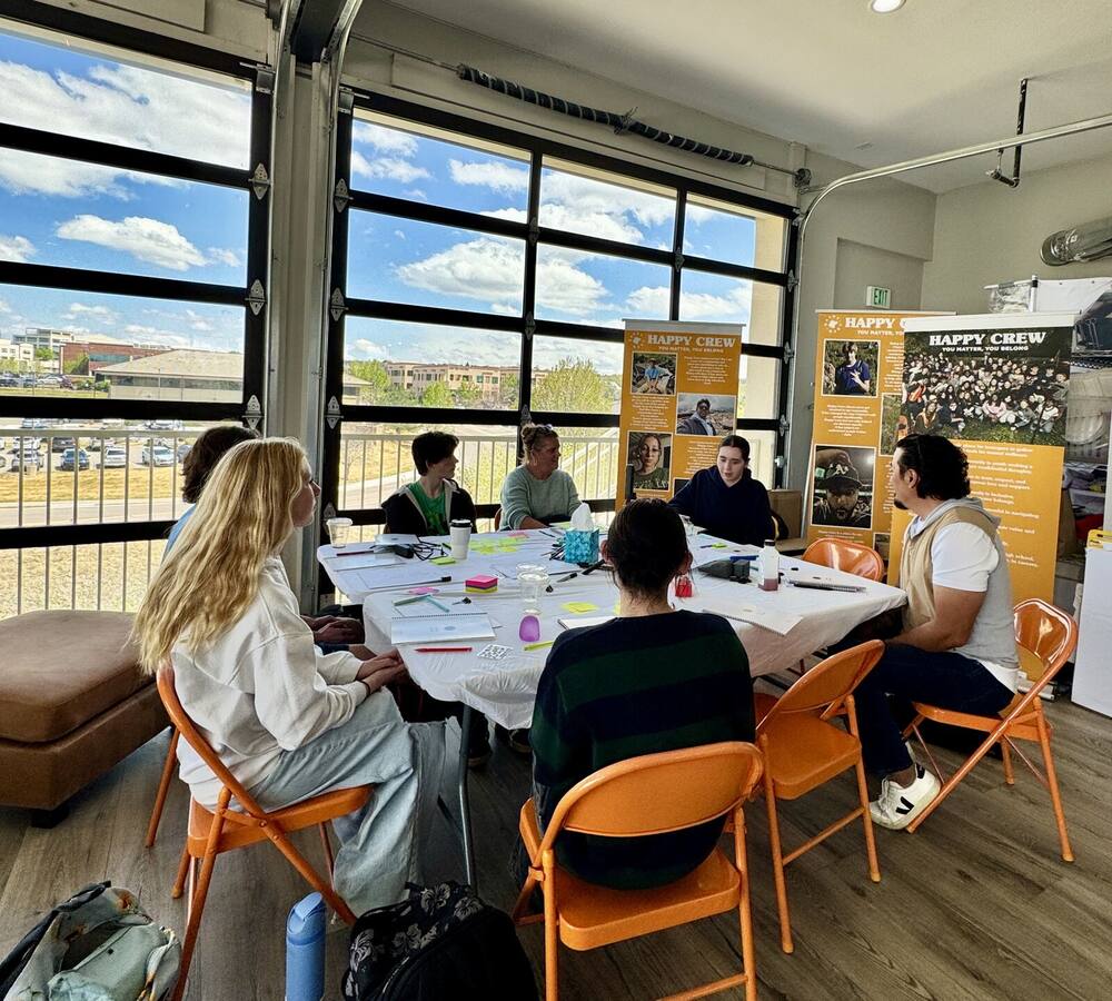 Students and foundation leaders working through the Know Myself journal at VALE
